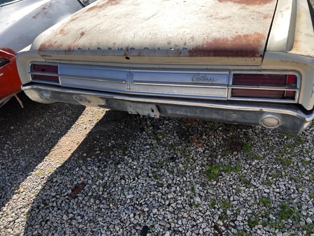 1965 Oldsmobile Rear Body Panel Trim (#65OLCBPTB)