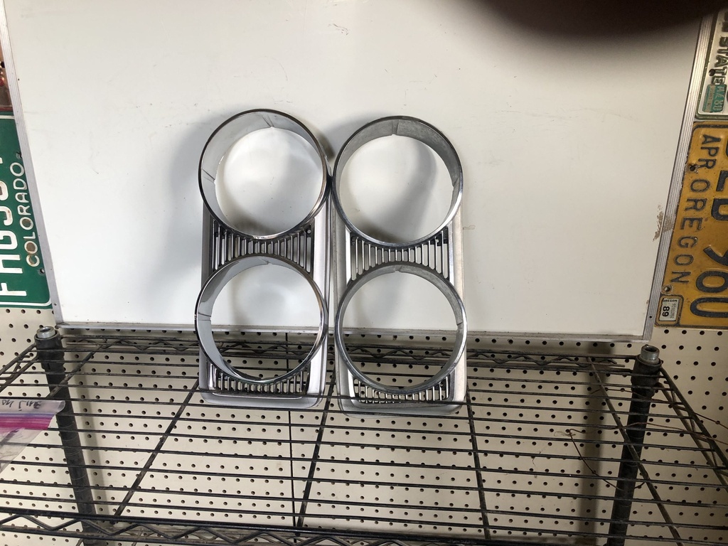 1969 Chrysler Headlight Bezels RH/LH (#69CRHLBZB)